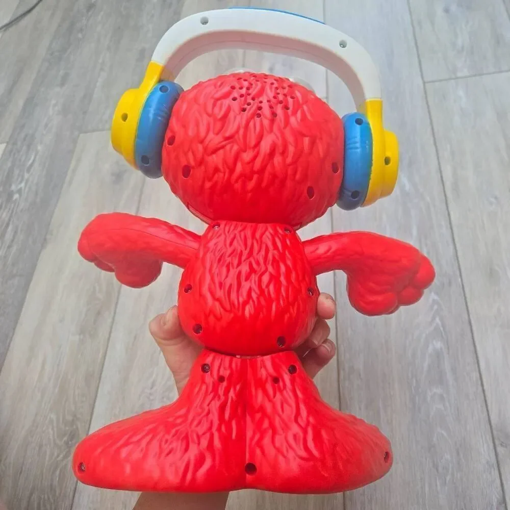 Sesame Street Let's Dance Elmo: 12-inch Elmo Toy Sings Sesame Street Toy for Kid